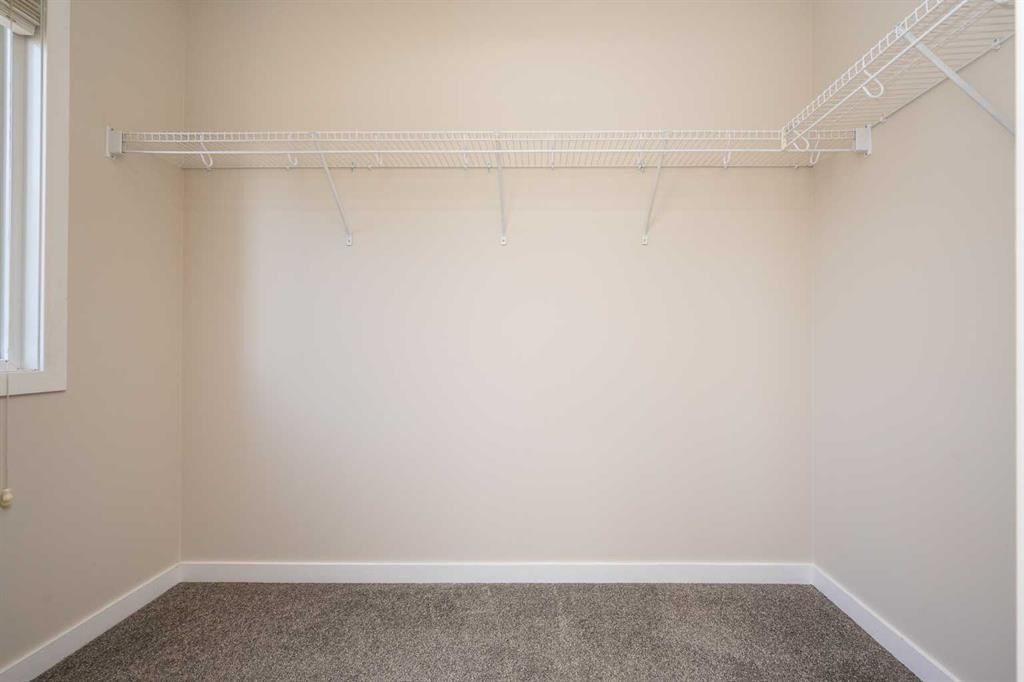 203 Copperstone Park Se, Calgary, AB - Indoor With Storage