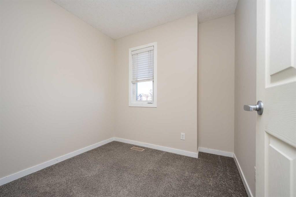203 Copperstone Park Se, Calgary, AB - Indoor Photo Showing Other Room