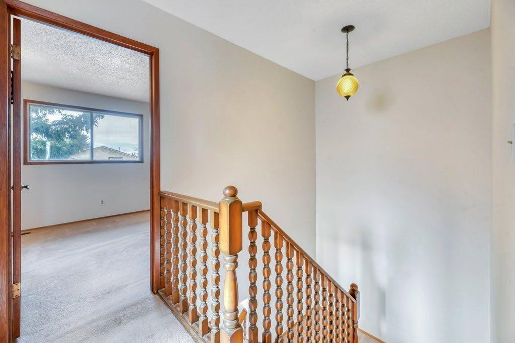 56 Cedarwood Hill Sw, Calgary, AB - Indoor Photo Showing Other Room