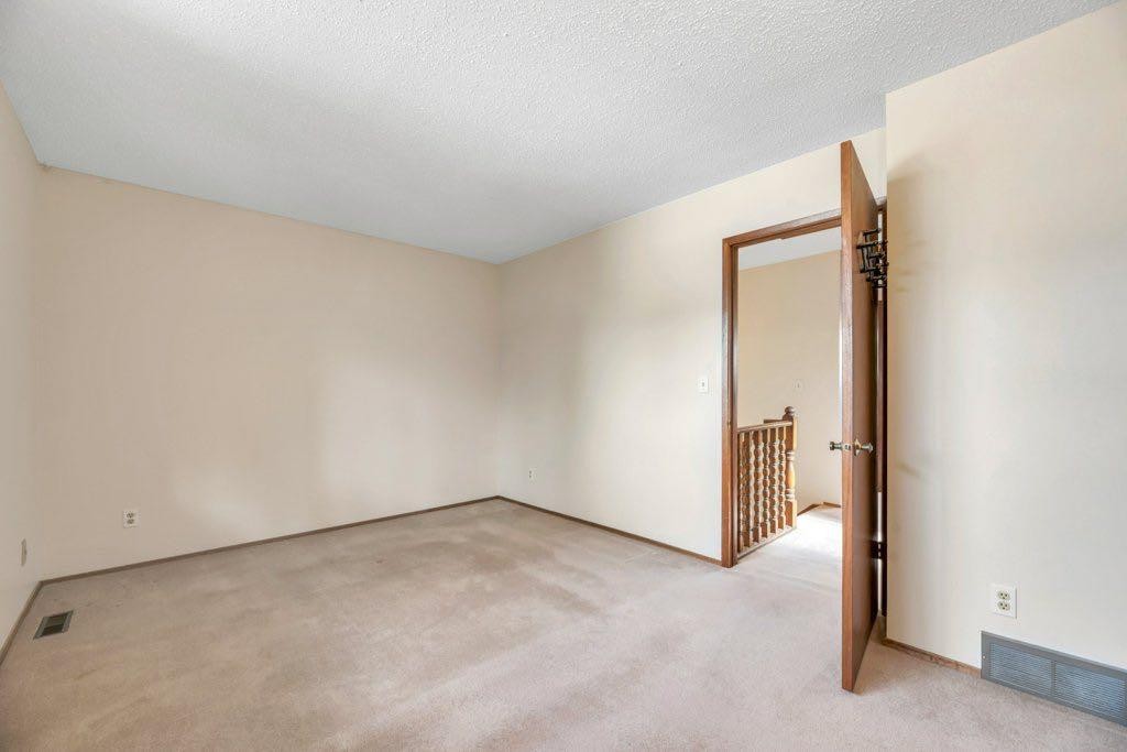 56 Cedarwood Hill Sw, Calgary, AB - Indoor Photo Showing Other Room