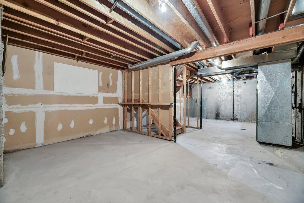 56 Cedarwood Hill Sw, Calgary, AB - Indoor Photo Showing Basement