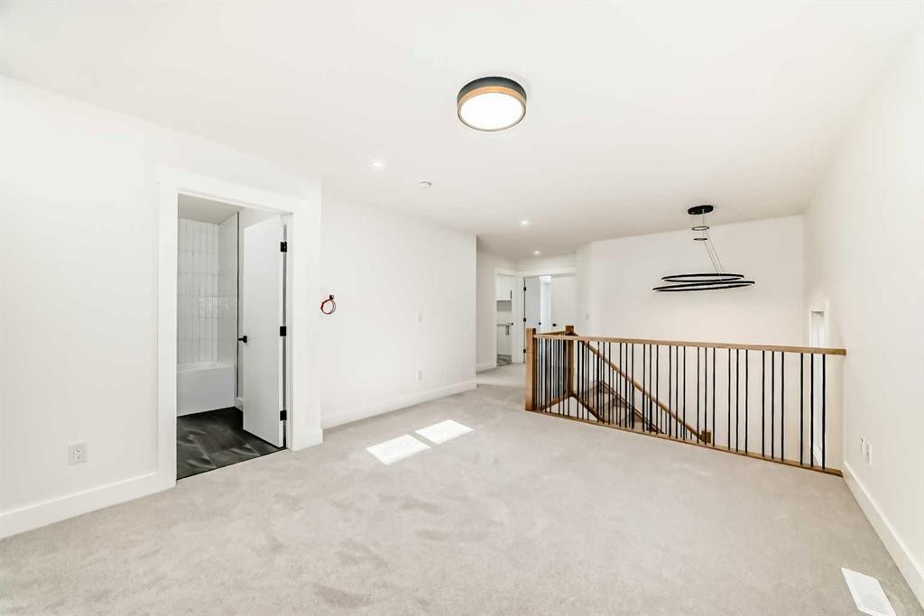 28 Saddlecrest Manor Ne, Calgary, AB - Indoor Photo Showing Other Room