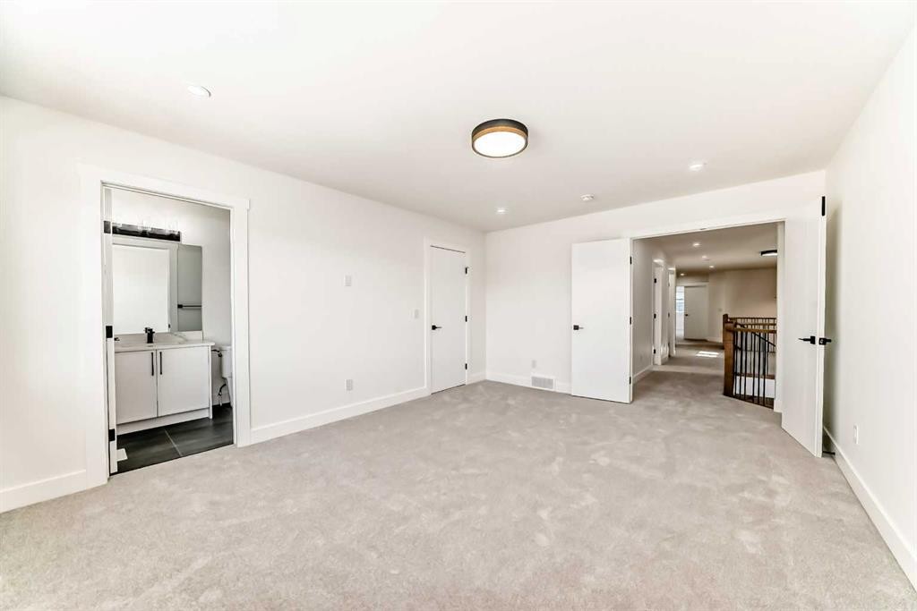 28 Saddlecrest Manor Ne, Calgary, AB - Indoor Photo Showing Other Room
