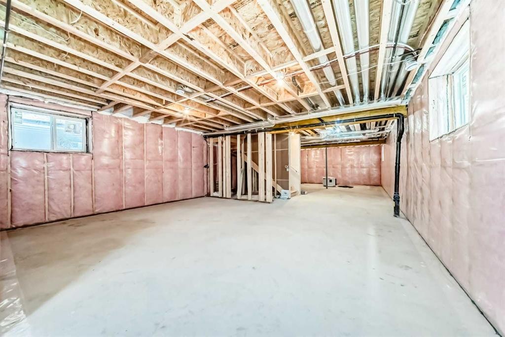 28 Saddlecrest Manor Ne, Calgary, AB - Indoor Photo Showing Basement