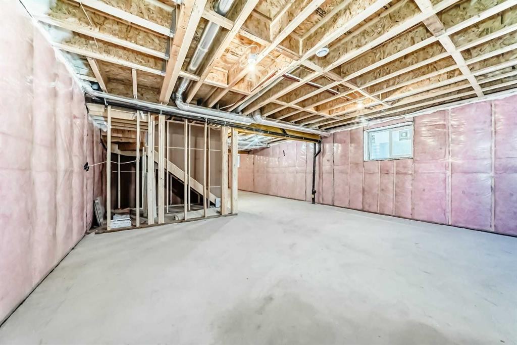 28 Saddlecrest Manor Ne, Calgary, AB - Indoor Photo Showing Basement