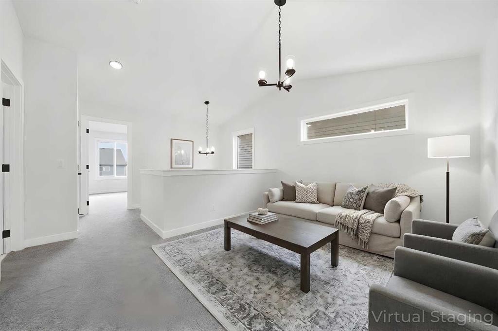 596 Buffaloberry Manor Se, Calgary, AB - Indoor Photo Showing Living Room