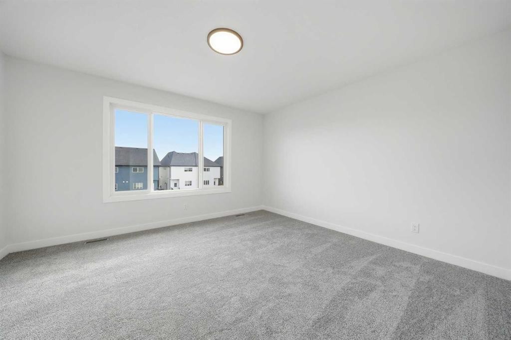 596 Buffaloberry Manor Se, Calgary, AB - Indoor Photo Showing Other Room