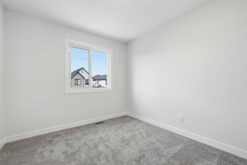 596 Buffaloberry Manor Se, Calgary, AB - Indoor Photo Showing Other Room
