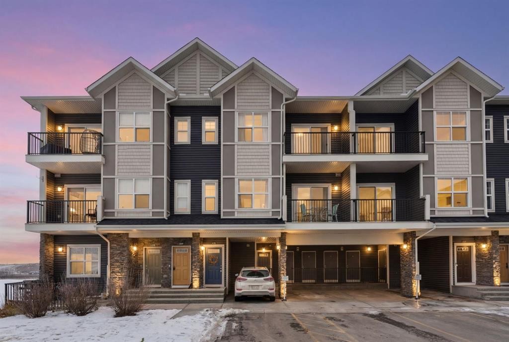 408-250 Fireside View, Cochrane, AB - Outdoor With Balcony With Facade
