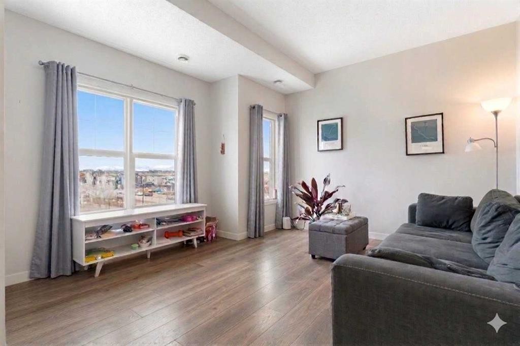 408-250 Fireside View, Cochrane, AB - Indoor Photo Showing Living Room