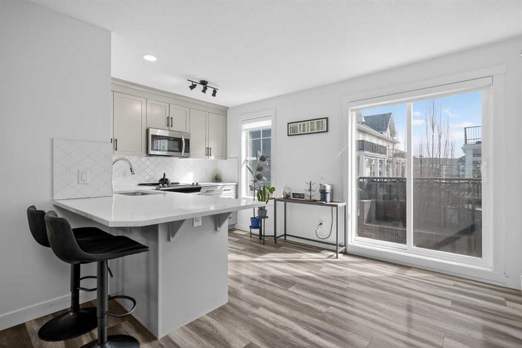 103 Cranbrook Walk Se, Calgary, AB - Indoor Photo Showing Kitchen With Upgraded Kitchen