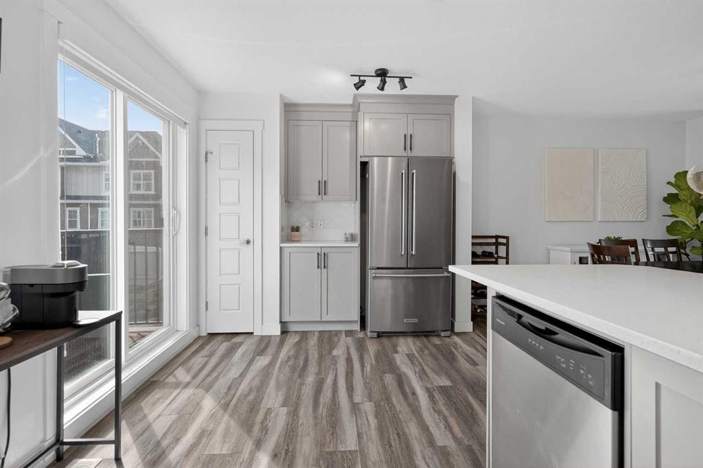 103 Cranbrook Walk Se, Calgary, AB - Indoor Photo Showing Kitchen With Stainless Steel Kitchen