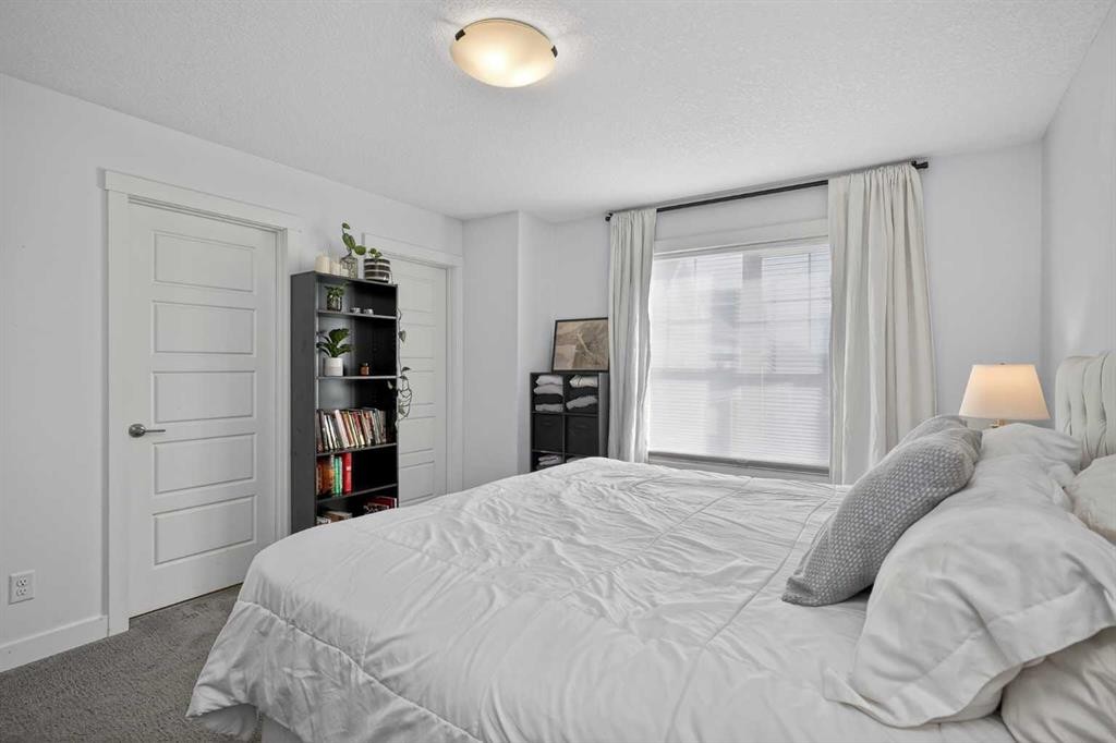 103 Cranbrook Walk Se, Calgary, AB - Indoor Photo Showing Bedroom