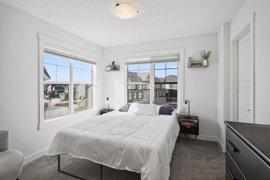 103 Cranbrook Walk Se, Calgary, AB - Indoor Photo Showing Bedroom