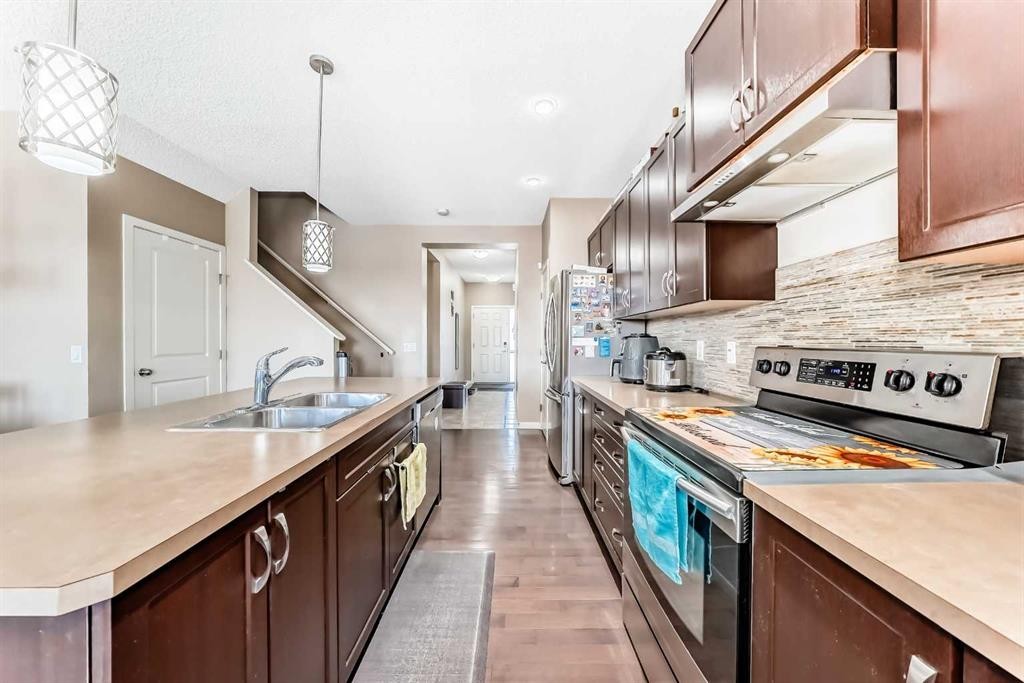 302 Auburn Crest Way Se, Calgary, AB - Indoor Photo Showing Kitchen With Double Sink