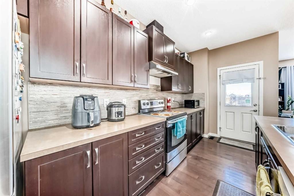 302 Auburn Crest Way Se, Calgary, AB - Indoor Photo Showing Kitchen With Double Sink