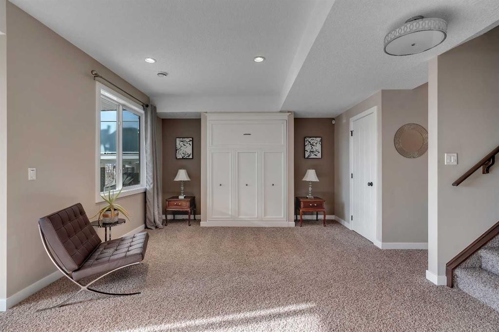 287 Sunset View, Cochrane, AB - Indoor Photo Showing Other Room