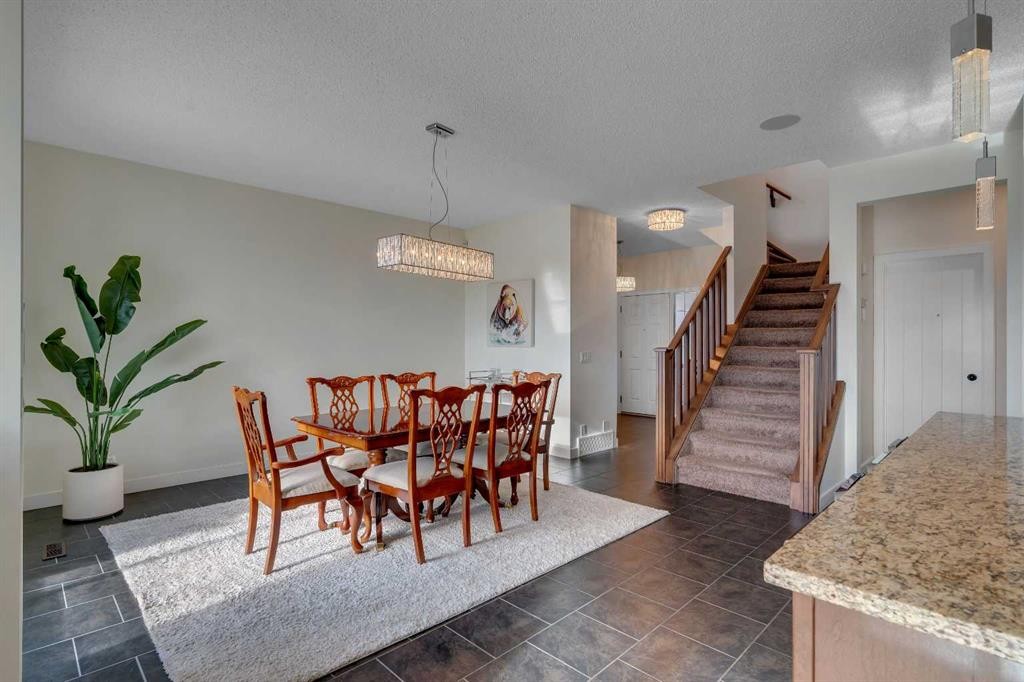 287 Sunset View, Cochrane, AB - Indoor Photo Showing Dining Room