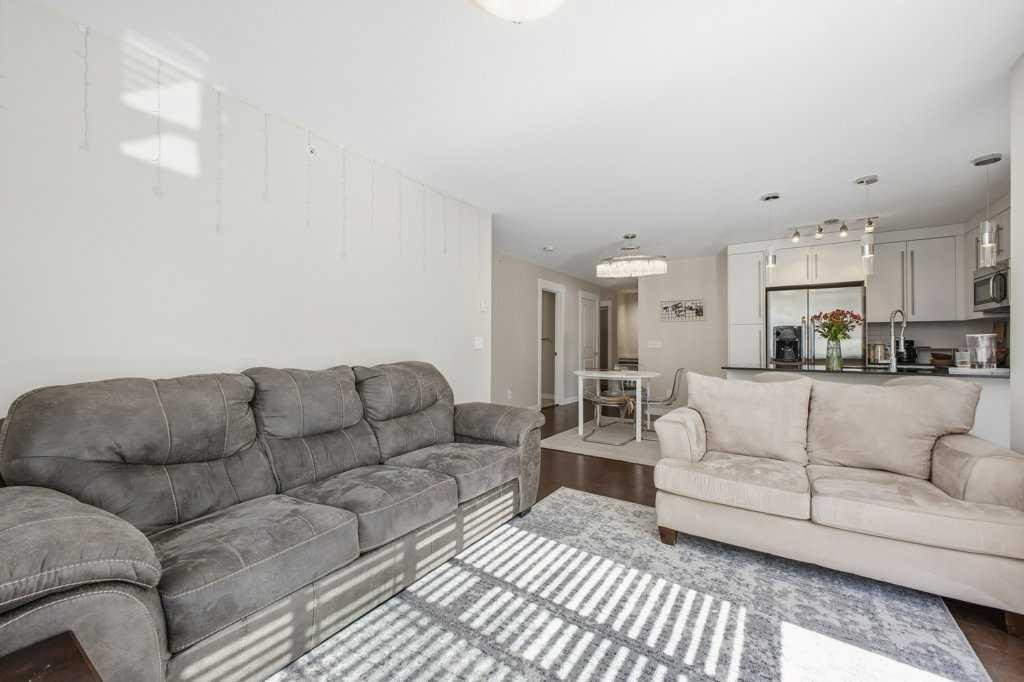 2413-11 Mahogany Row Se, Calgary, AB - Indoor Photo Showing Living Room