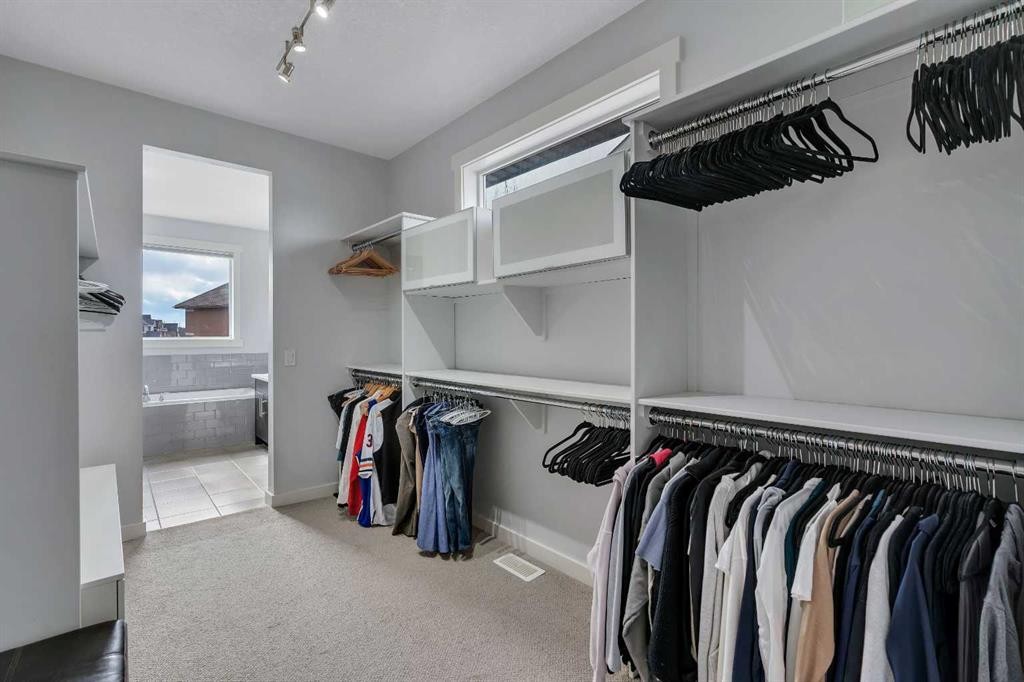 151 Stonemere Green, Chestermere, AB - Indoor With Storage