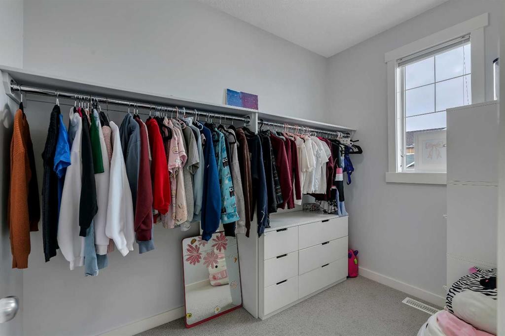 151 Stonemere Green, Chestermere, AB - Indoor With Storage