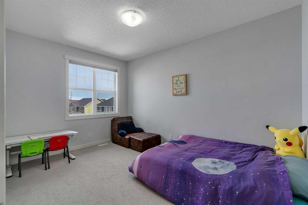 151 Stonemere Green, Chestermere, AB - Indoor Photo Showing Bedroom