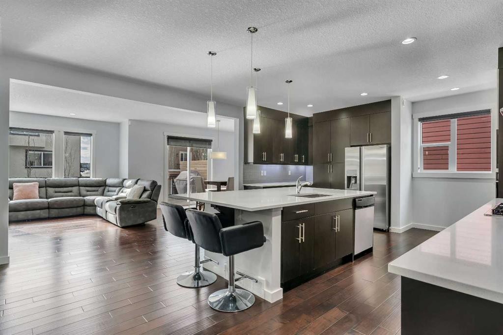151 Stonemere Green, Chestermere, AB - Indoor Photo Showing Kitchen With Stainless Steel Kitchen