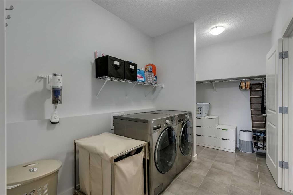 151 Stonemere Green, Chestermere, AB - Indoor Photo Showing Laundry Room