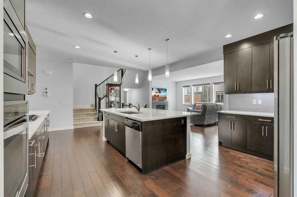 151 Stonemere Green, Chestermere, AB - Indoor Photo Showing Kitchen With Stainless Steel Kitchen With Upgraded Kitchen