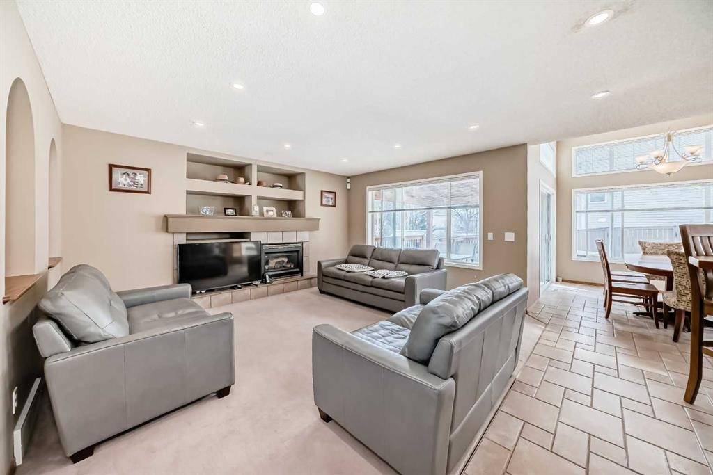 3767 Springbank Drive Sw, Calgary, AB - Indoor Photo Showing Living Room With Fireplace