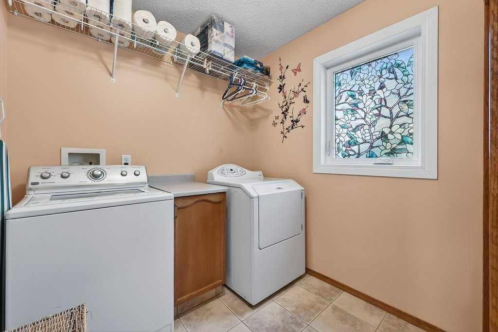 108 Hawkstone Close Nw, Calgary, AB - Indoor Photo Showing Laundry Room