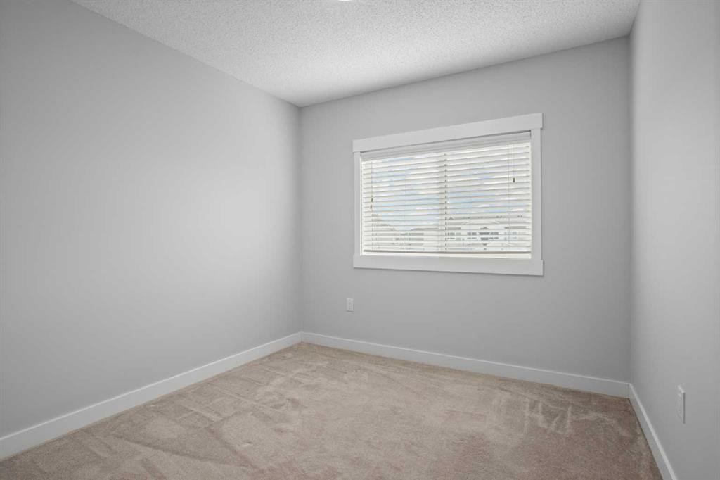 100-351 Monteith Drive Se, High River, AB - Indoor Photo Showing Other Room