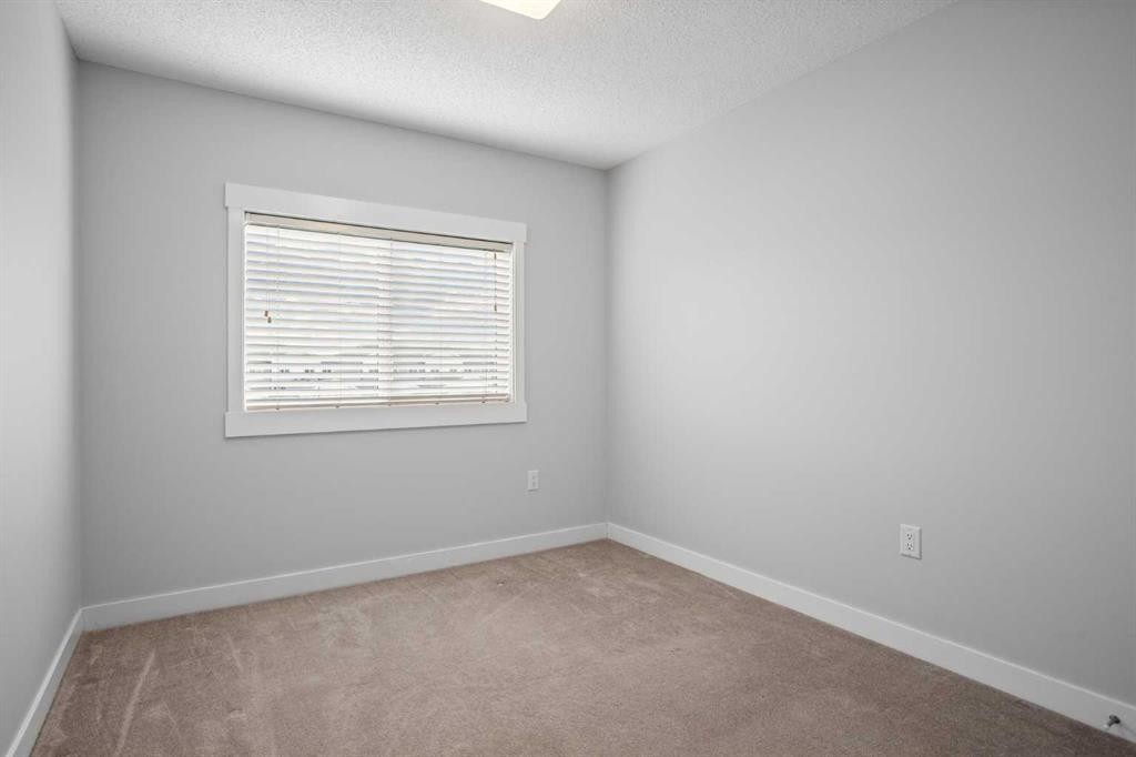 100-351 Monteith Drive Se, High River, AB - Indoor Photo Showing Other Room