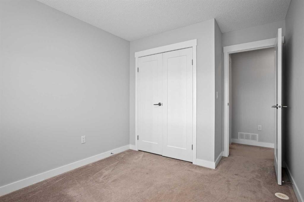 100-351 Monteith Drive Se, High River, AB - Indoor Photo Showing Other Room