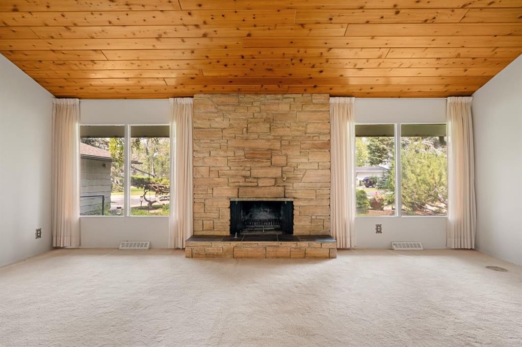 427 Willow Grove Crescent Se, Calgary, AB - Indoor Photo Showing Living Room With Fireplace