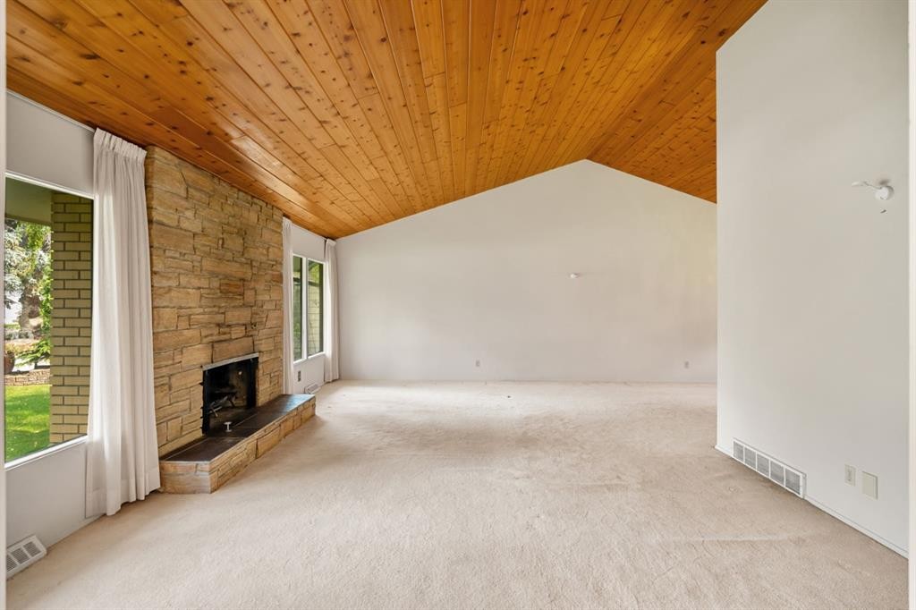 427 Willow Grove Crescent Se, Calgary, AB - Indoor Photo Showing Other Room With Fireplace