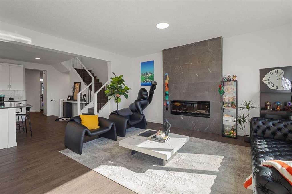 75 Royston Heath Nw, Calgary, AB - Indoor With Fireplace
