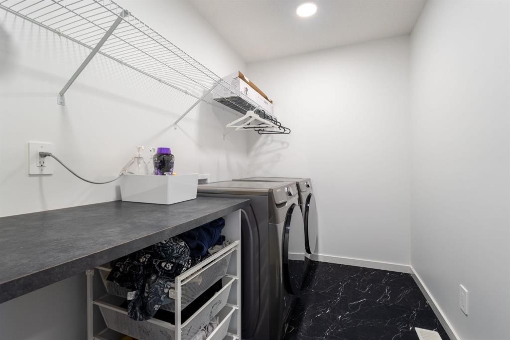 75 Royston Heath Nw, Calgary, AB - Indoor Photo Showing Laundry Room