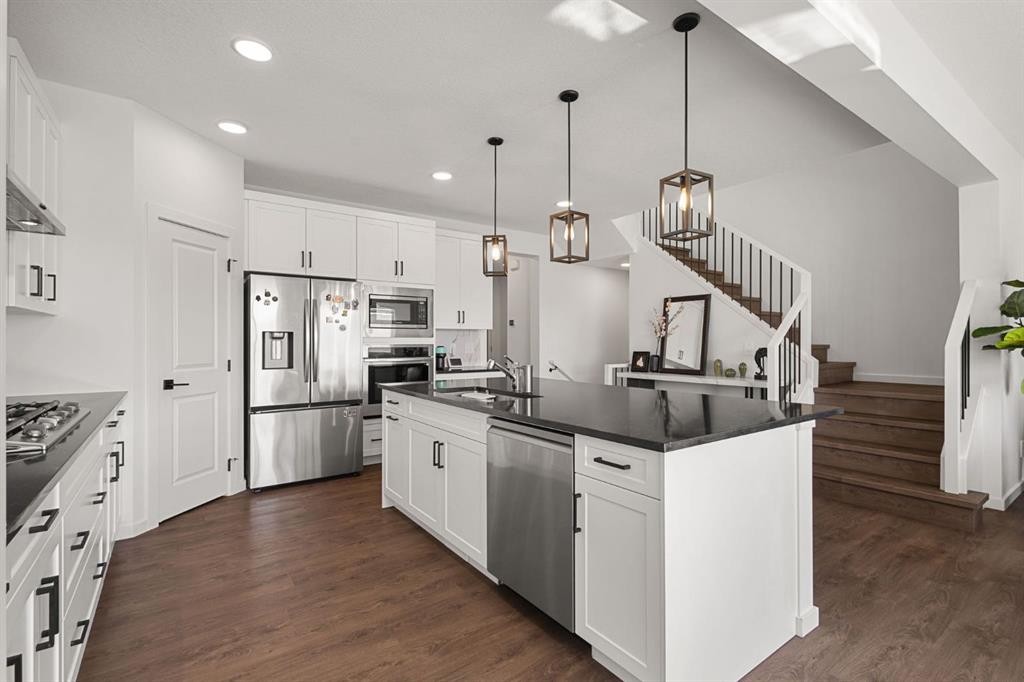 75 Royston Heath Nw, Calgary, AB - Indoor Photo Showing Kitchen With Upgraded Kitchen