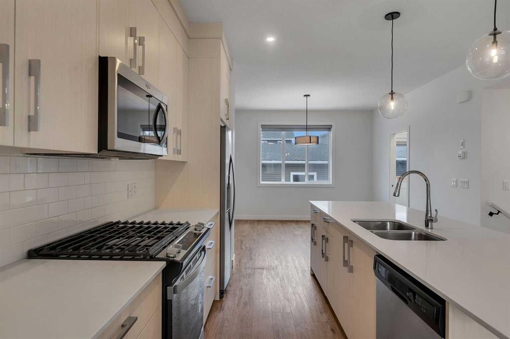 103 Cornerstone Path Ne, Calgary, AB - Indoor Photo Showing Kitchen With Double Sink With Upgraded Kitchen