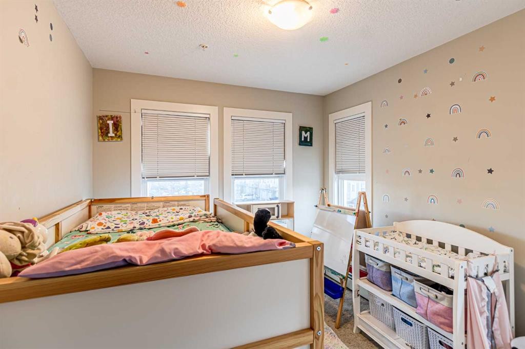 302-2300 Evanston Square Nw, Calgary, AB - Indoor Photo Showing Bedroom