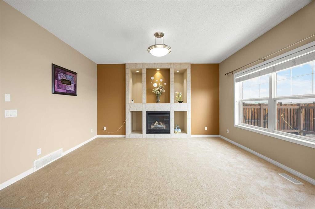65 Panora Way Nw, Calgary, AB - Indoor With Fireplace