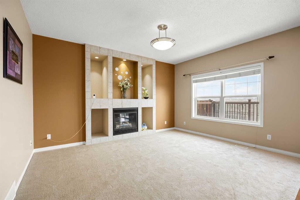 65 Panora Way Nw, Calgary, AB - Indoor With Fireplace