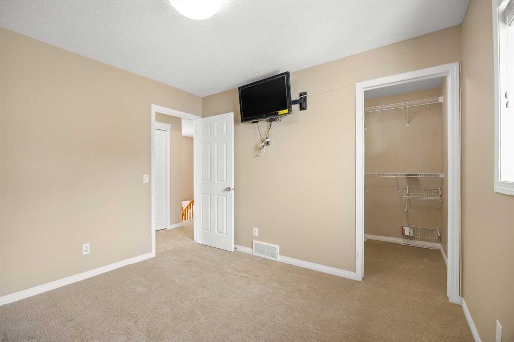 65 Panora Way Nw, Calgary, AB - Indoor Photo Showing Other Room