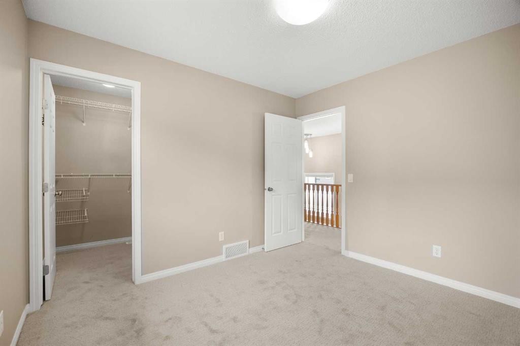 65 Panora Way Nw, Calgary, AB - Indoor Photo Showing Other Room