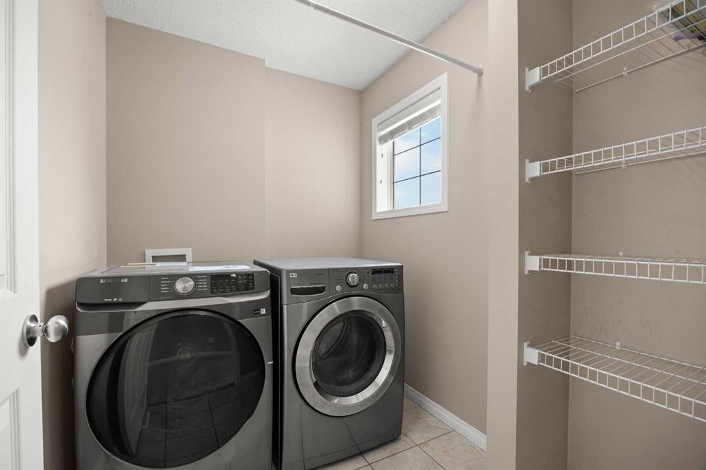65 Panora Way Nw, Calgary, AB - Indoor Photo Showing Laundry Room