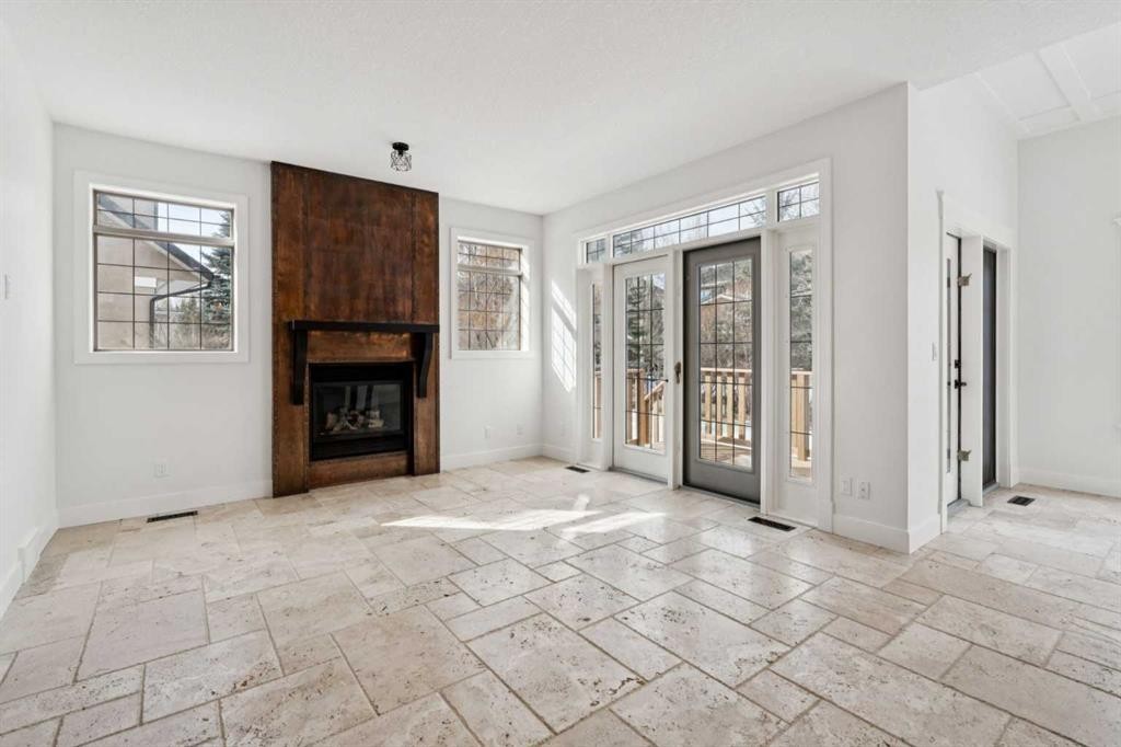 1 Discovery Ridge Link Sw, Calgary, AB - Indoor With Fireplace