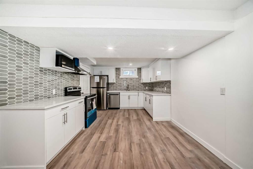 23 Marbank Way Ne, Calgary, AB - Indoor Photo Showing Kitchen With Upgraded Kitchen