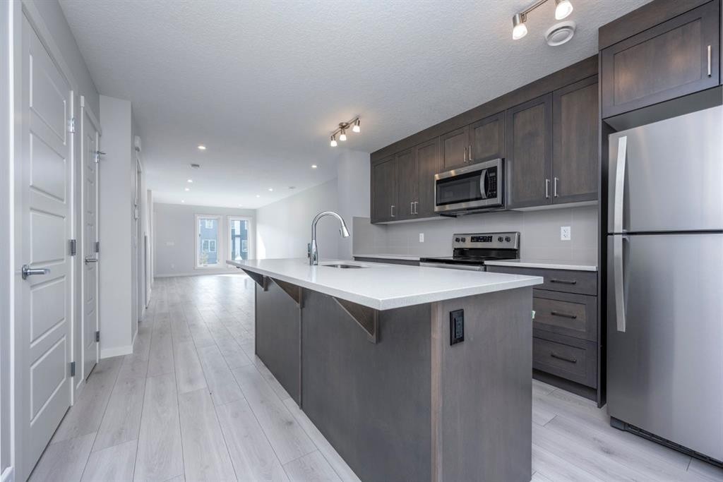 412 Seton Circle Se, Calgary, AB - Indoor Photo Showing Kitchen With Upgraded Kitchen
