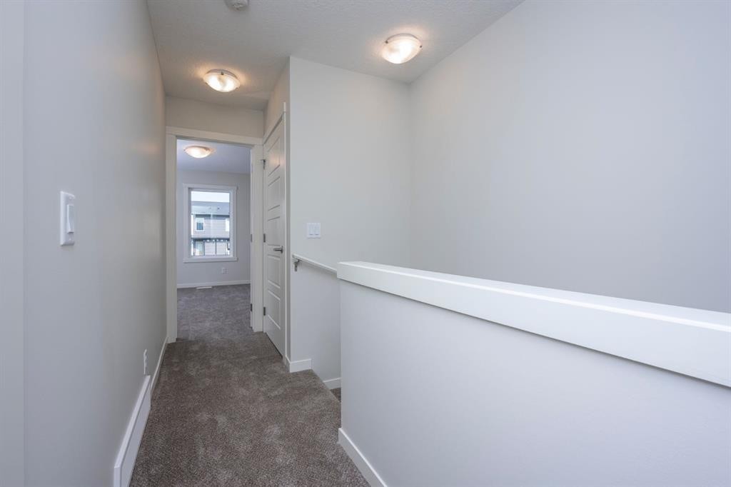 412 Seton Circle Se, Calgary, AB - Indoor Photo Showing Other Room